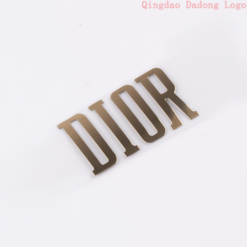 Nickel thin letter sticker trademark